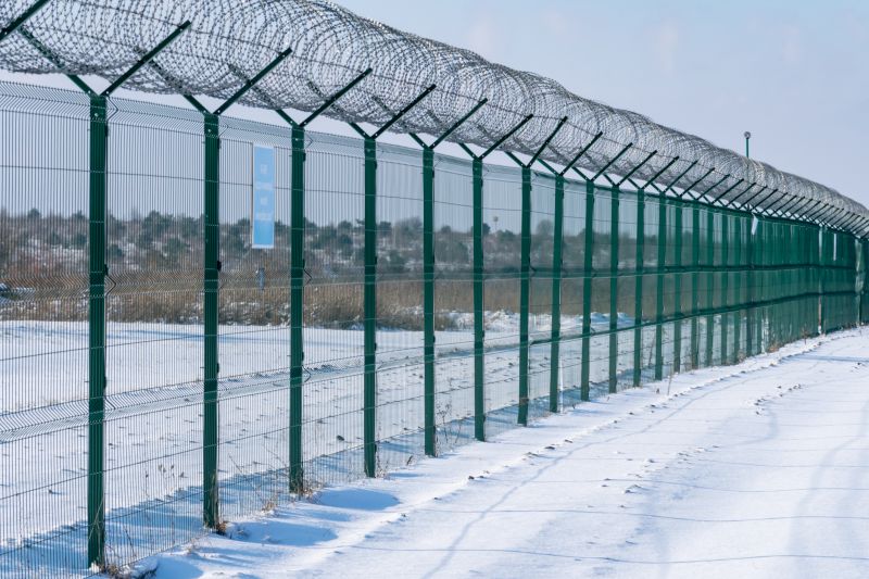 Barb Wire Fence with Snow Cover